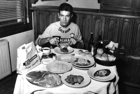 The Italian cyclist Felice Gimondi eating his daily food ration during the Giro d'Italia. Sanremo, 24th May 1968 (Photo by Giorgio Lotti/Mondadori Portfolio via Getty Images)